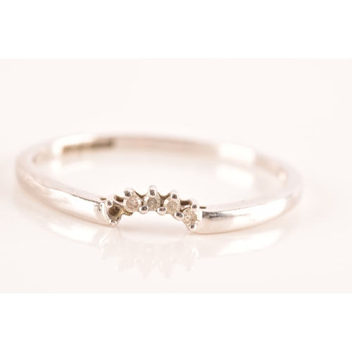 28 - A set of three 9ct white gold and diamond rings, to include a floral ring set with seven round brill... 