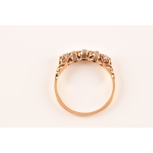 29 - A five stone 18ct yellow gold, set with five old mine diamonds with a combined approximate weight of... 