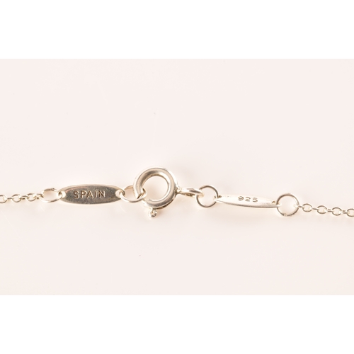 31 - Tiffany & Co. A group of Perreti design jewellery, to include a silver teardrop bean chain brace... 