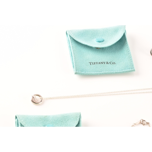 31 - Tiffany & Co. A group of Perreti design jewellery, to include a silver teardrop bean chain brace... 