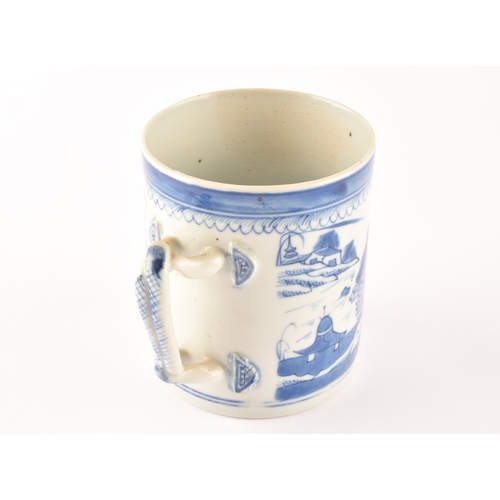 216 - A 19th century Chinese blue and white porcelain tankard, decoration depicting a rural coastal villag... 