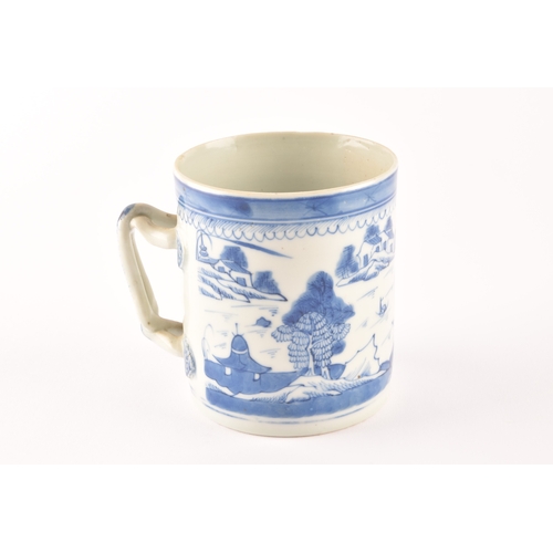 216 - A 19th century Chinese blue and white porcelain tankard, decoration depicting a rural coastal villag... 