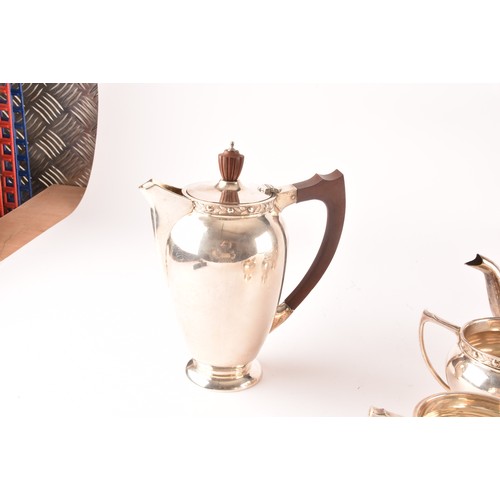 119 - A Elizabeth II five piece Garrard & Co silver tea and coffee set, including a tea pot, coffee po... 