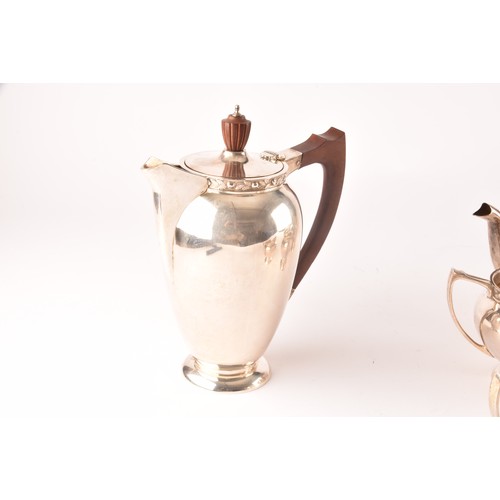 119 - A Elizabeth II five piece Garrard & Co silver tea and coffee set, including a tea pot, coffee po... 