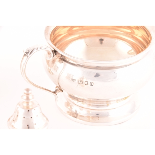 120 - A collection of silverware, including a George VI silver creamer and sugar bowl, both with full hall... 