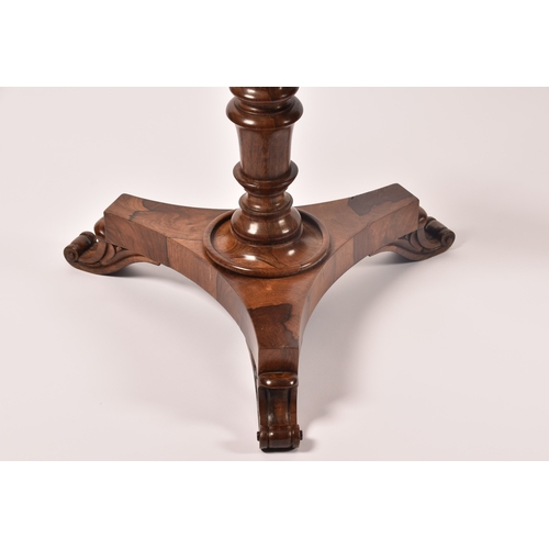 299 - A pair of 19th century rosewood pedestal tables, with figured tops, supported on turned legs, with t... 