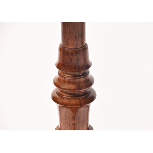 299 - A pair of 19th century rosewood pedestal tables, with figured tops, supported on turned legs, with t... 