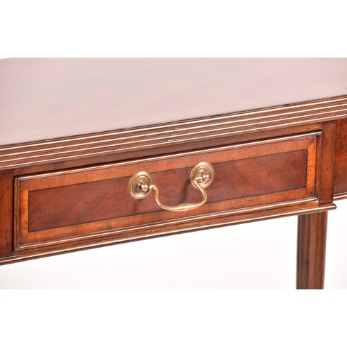 301 - A Regency style flame mahogany side table with crossbanded top, single draw and supported on reeded ... 