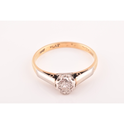 33 - A mid 20th century 18ct yellow gold and platinum solitaire ring, set to centre with a round brillian... 