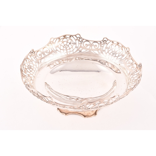 124 - A George V silver pierced pedestal footed bowl, hallmarked Sheffield 1920 by John Round & Son Lt... 