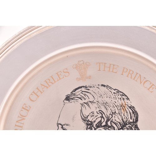 127 - A Elizabeth II silver dish with a portrait of HRH Prince Charles commemorating his investiture, full... 