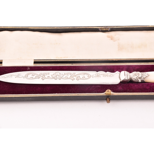 131 - An Elizabeth II silver plated cake knife, with mother of pearl handle cake knife, together with a El... 