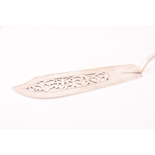 132 - A Victorian silver fish slice, hallmarked London 1865 by HSI, length 32 cm, 4.1 ozt / 130 grams.