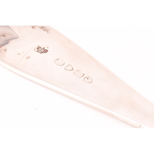 132 - A Victorian silver fish slice, hallmarked London 1865 by HSI, length 32 cm, 4.1 ozt / 130 grams.