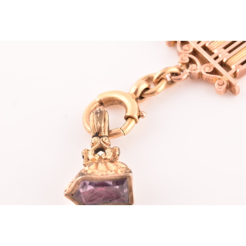 73 - A late 19th century 15ct yellow and rose gold pocket watch chain, with 18ct yellow gold clasp and gi... 