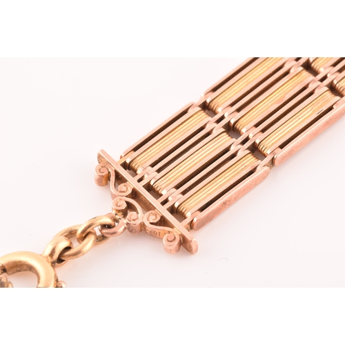 73 - A late 19th century 15ct yellow and rose gold pocket watch chain, with 18ct yellow gold clasp and gi... 