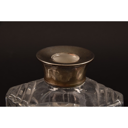 142 - A silver mounted cut crystal glass whisky decanter and stopper, with silver mounted collar, hallmark... 