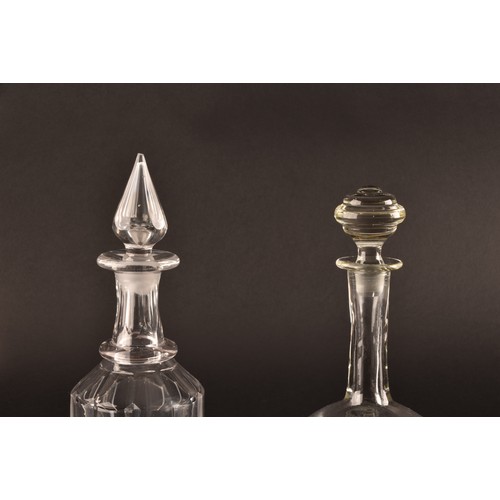 232 - A matched pair of Victorian cut glass decanters and stoppers, together with a pair of engraved decan... 