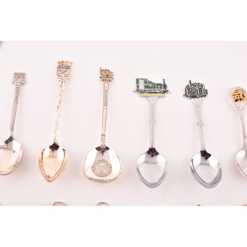 145 - A collection of twenty-eight teaspoons, some silver, of various maker's and dates, along with two gi... 