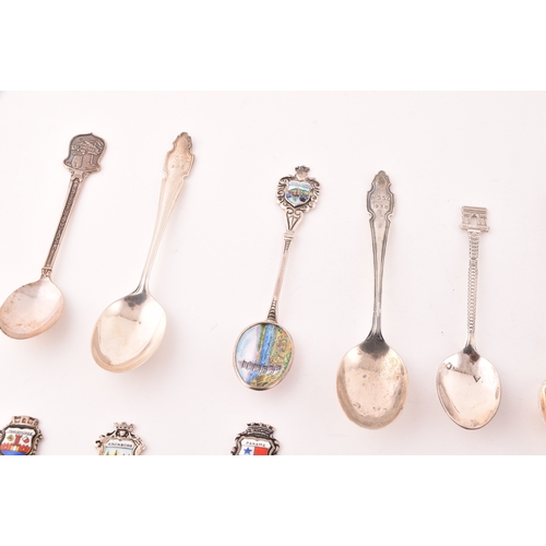 145 - A collection of twenty-eight teaspoons, some silver, of various maker's and dates, along with two gi... 