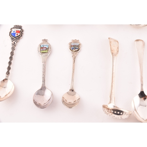 145 - A collection of twenty-eight teaspoons, some silver, of various maker's and dates, along with two gi... 