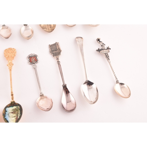 145 - A collection of twenty-eight teaspoons, some silver, of various maker's and dates, along with two gi... 