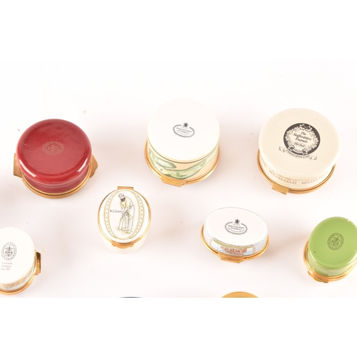 87 - A collection of enamel pill boxes of varying shapes and sizes, including maker's such as Halcyon Day... 