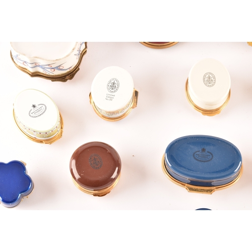 87 - A collection of enamel pill boxes of varying shapes and sizes, including maker's such as Halcyon Day... 