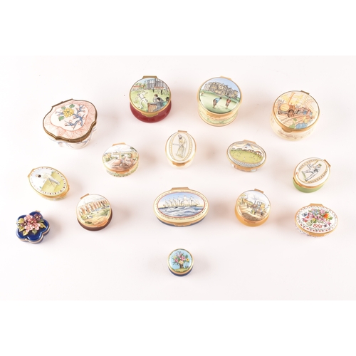 87 - A collection of enamel pill boxes of varying shapes and sizes, including maker's such as Halcyon Day... 