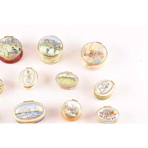 87 - A collection of enamel pill boxes of varying shapes and sizes, including maker's such as Halcyon Day... 