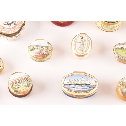 87 - A collection of enamel pill boxes of varying shapes and sizes, including maker's such as Halcyon Day... 