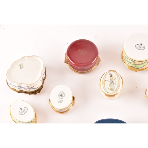 87 - A collection of enamel pill boxes of varying shapes and sizes, including maker's such as Halcyon Day... 