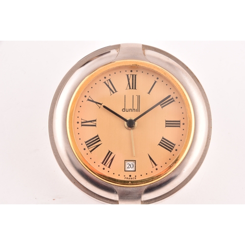 279 - A Dunhill quartz desk clock, the gilt dial with Roman numerals, date aperture, numbered D 10314, in ... 