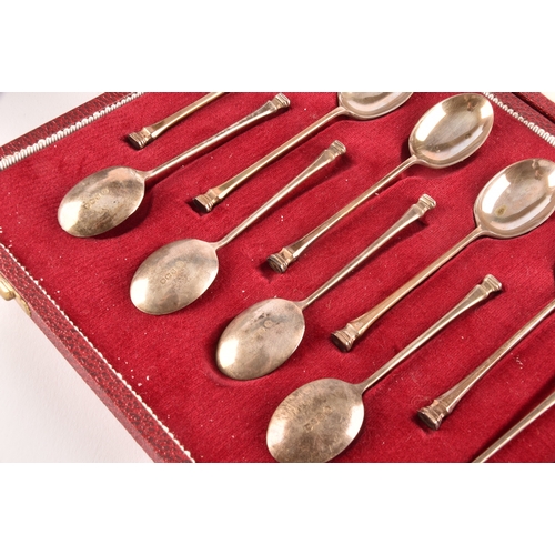 147 - A collection of silver items, including a Victorian sugar basket hallmarked Birmingham 1898 by Henry... 