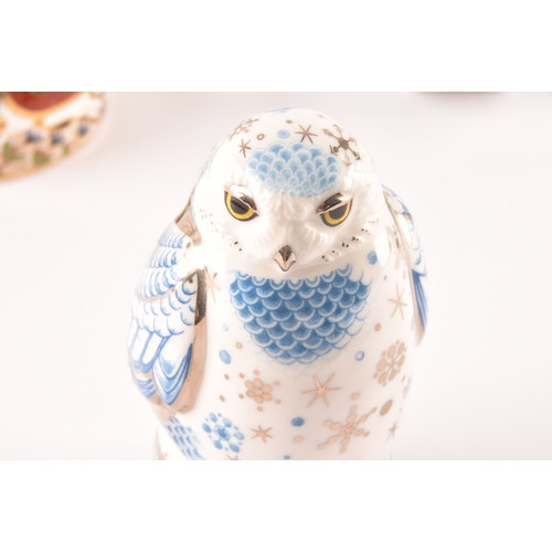 240 - A collection of porcelain, including pieces by Asprey, Royal Worcester, Royal Crown Derby owl candle... 