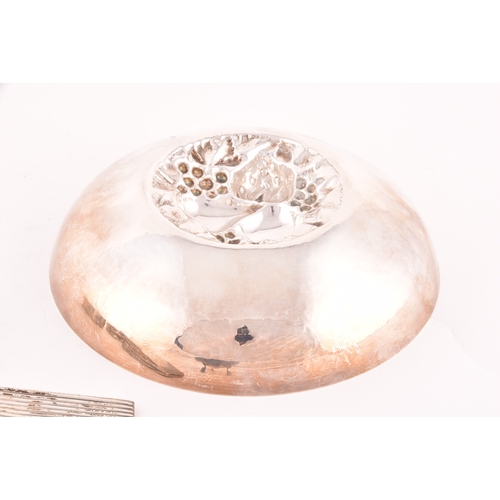 148 - A collection of silver items, including a footed dish, a decorative bowl with embossed fruit decorat... 