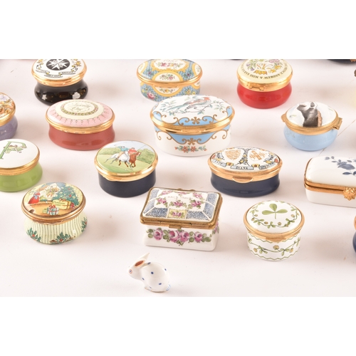 88 - A large collection of enamel pill boxes of varying shapes and sizes, maker's including Royal Worcest... 