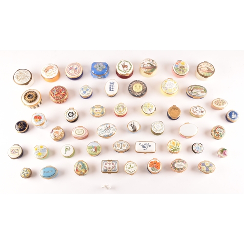 88 - A large collection of enamel pill boxes of varying shapes and sizes, maker's including Royal Worcest... 