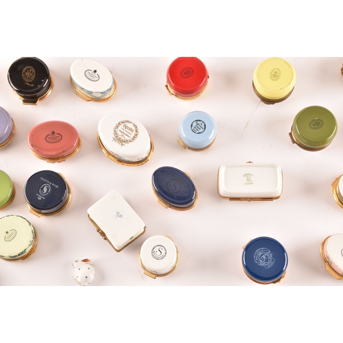 88 - A large collection of enamel pill boxes of varying shapes and sizes, maker's including Royal Worcest... 