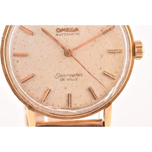 94 - A 1960s Omega Seamaster De Ville 18ct gold automatic wristwatch, the silvered dial with baton indice... 