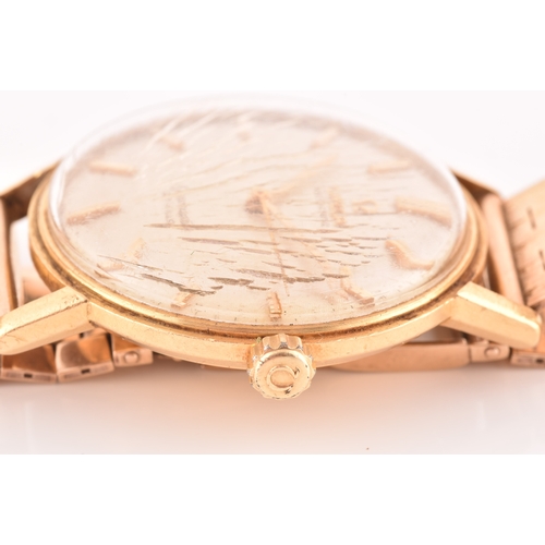 94 - A 1960s Omega Seamaster De Ville 18ct gold automatic wristwatch, the silvered dial with baton indice... 