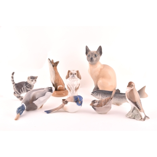 241 - A collection of nine Royal Copenhagen figurines, including a cat, kitten, dog, fish, duck, fox and b... 