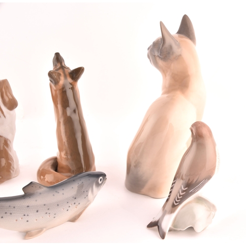 241 - A collection of nine Royal Copenhagen figurines, including a cat, kitten, dog, fish, duck, fox and b... 