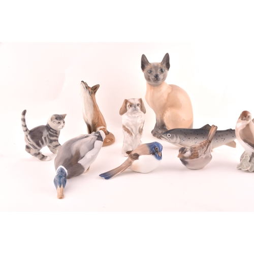 241 - A collection of nine Royal Copenhagen figurines, including a cat, kitten, dog, fish, duck, fox and b... 