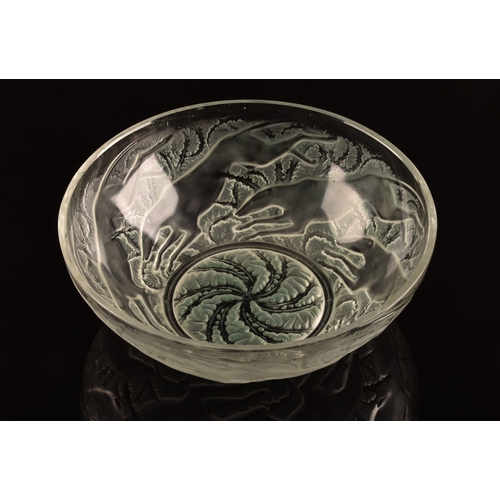 242 - Rene Lalique (French, 1860-1945). A 'Chiens' pattern coloured and frosted glass bowl, designed 1921,... 