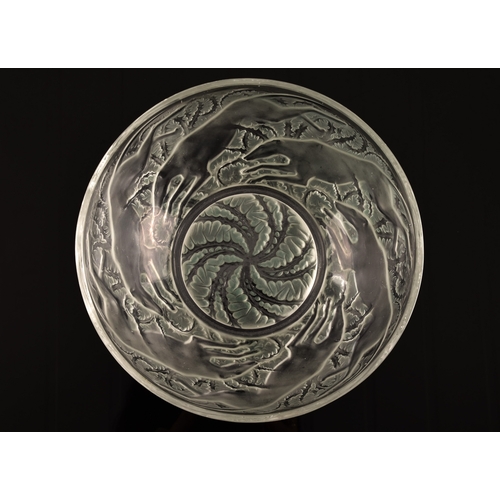 242 - Rene Lalique (French, 1860-1945). A 'Chiens' pattern coloured and frosted glass bowl, designed 1921,... 