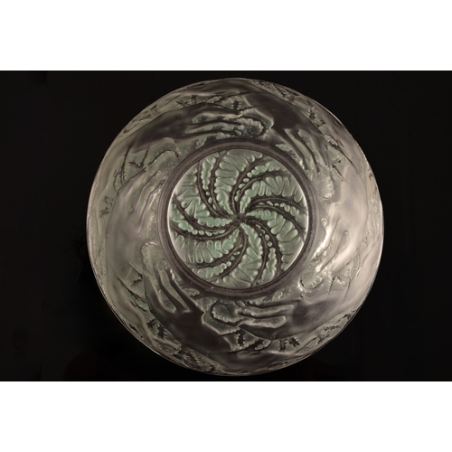 242 - Rene Lalique (French, 1860-1945). A 'Chiens' pattern coloured and frosted glass bowl, designed 1921,... 