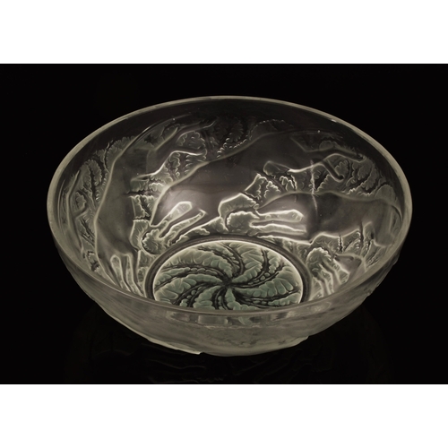 242 - Rene Lalique (French, 1860-1945). A 'Chiens' pattern coloured and frosted glass bowl, designed 1921,... 