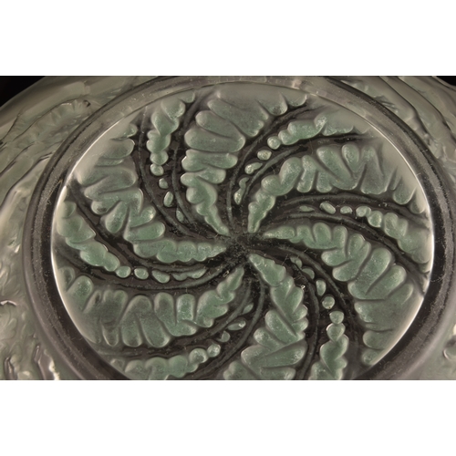 242 - Rene Lalique (French, 1860-1945). A 'Chiens' pattern coloured and frosted glass bowl, designed 1921,... 