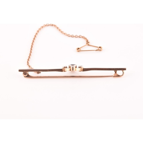 43 - A 15ct rose gold bar brooch, set with a round old cut sapphire and four round eight cut diamonds, wi... 